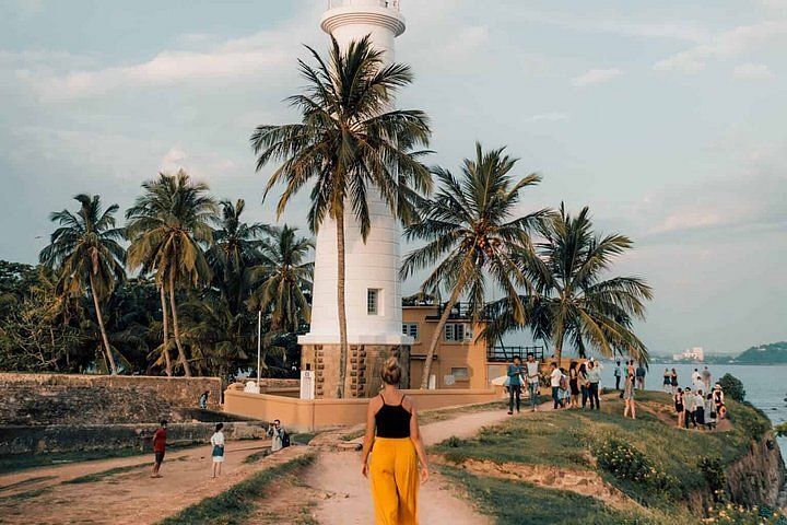 A guest walking the ramparts by Galle lighthouse